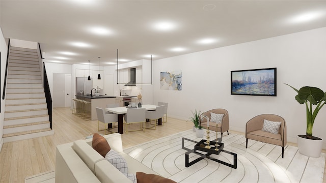 1128 W Pierce St, Houston, TX 77019 - living room featuring stairs, light wood-style floors, and baseboards