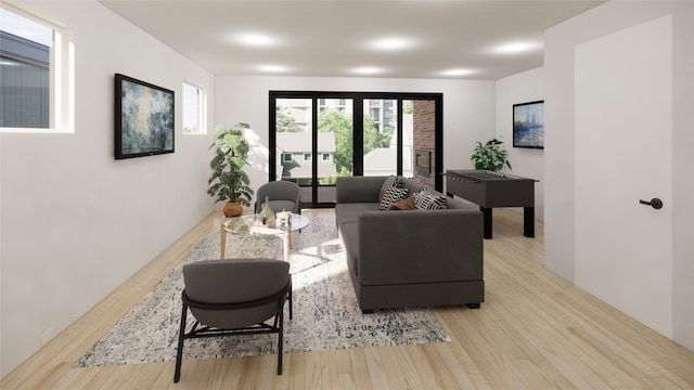 1128 W Pierce St, Houston, TX 77019 - living room with wood finished floors and plenty of natural light