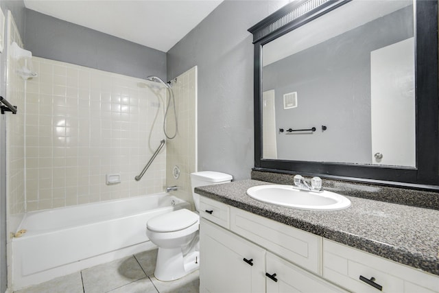bathroom with visible vents, toilet, tile patterned floors, vanity, and  shower combination