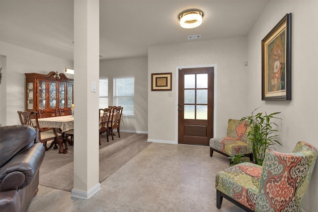 3311 Passage Ln, Conroe, TX 77301 - entryway featuring plenty of natural light, light tile patterned floors, and baseboards
