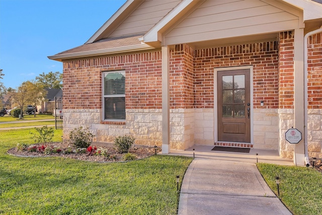 3311 Passage Ln, Conroe, TX 77301 - entrance to property featuring brick siding, a lawn, and stone siding