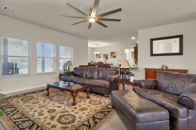 3311 Passage Ln, Conroe, TX 77301 - living room with a ceiling fan, recessed lighting, and baseboards