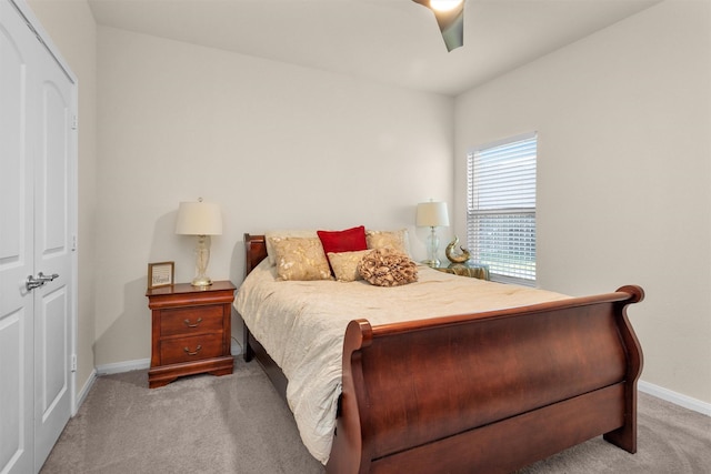 3311 Passage Ln, Conroe, TX 77301 - bedroom featuring light colored carpet, baseboards, and a ceiling fan