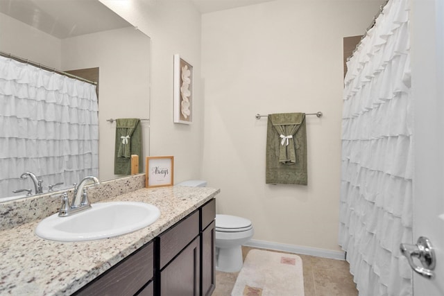 3311 Passage Ln, Conroe, TX 77301 - full bath featuring toilet, vanity, tile patterned flooring, baseboards, and a shower with shower curtain
