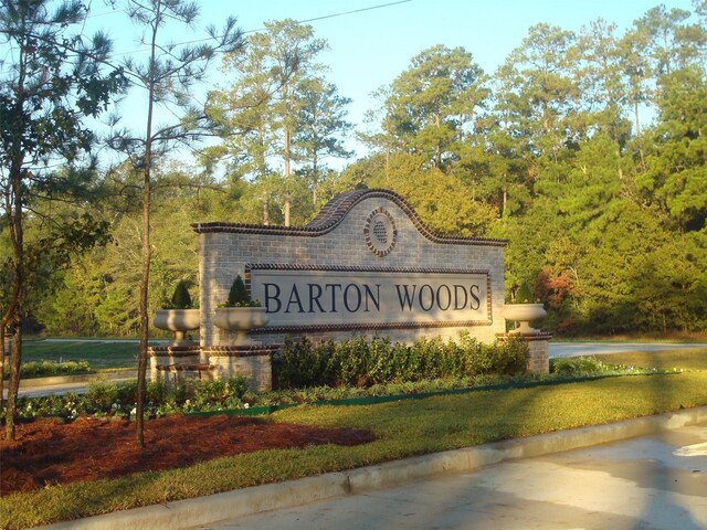 3311 Passage Ln, Conroe, TX 77301 - community sign with a wooded view