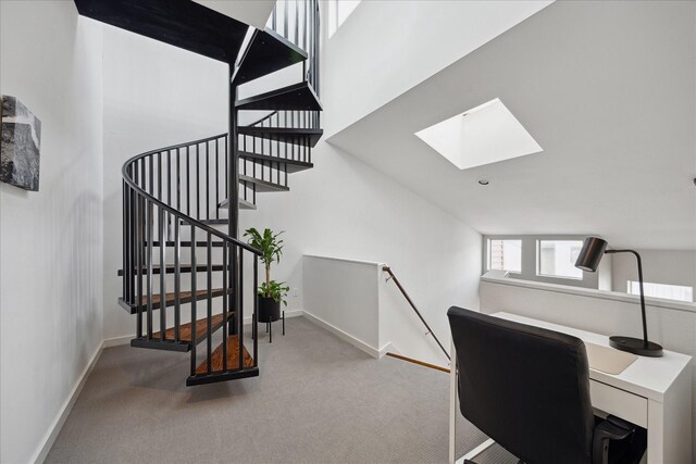 2976 Commerce St, Houston, TX 77003 - carpeted office space with a skylight and baseboards