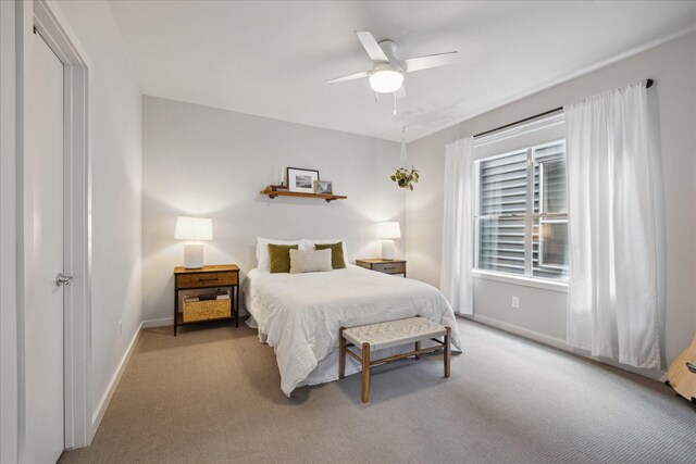2976 Commerce St, Houston, TX 77003 - bedroom featuring carpet, baseboards, and ceiling fan