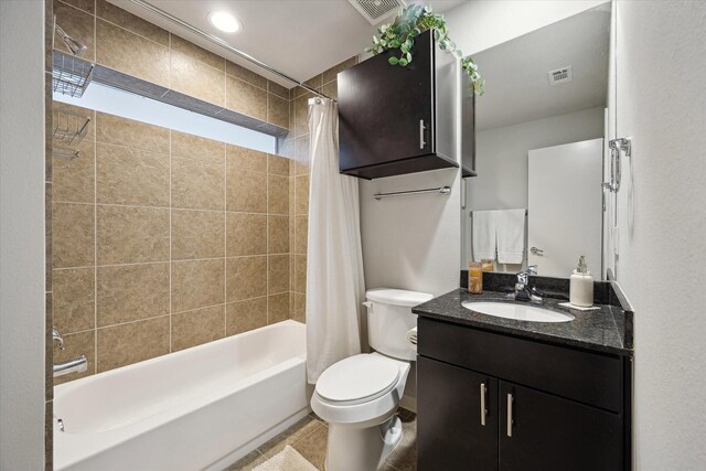 2976 Commerce St, Houston, TX 77003 - bathroom with shower / bath combination with curtain, vanity, and toilet