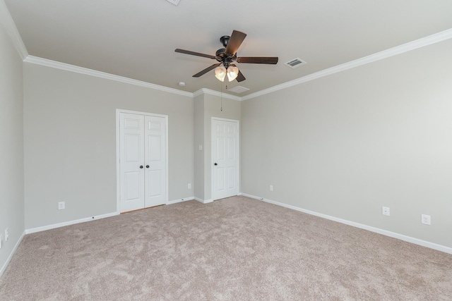 5911 Grantgrala Dr, Katy, TX 77493 - unfurnished bedroom featuring a closet, visible vents, baseboards, ornamental molding, and carpet floors