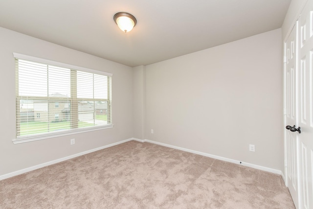 5911 Grantgrala Dr, Katy, TX 77493 - spare room with light carpet and baseboards