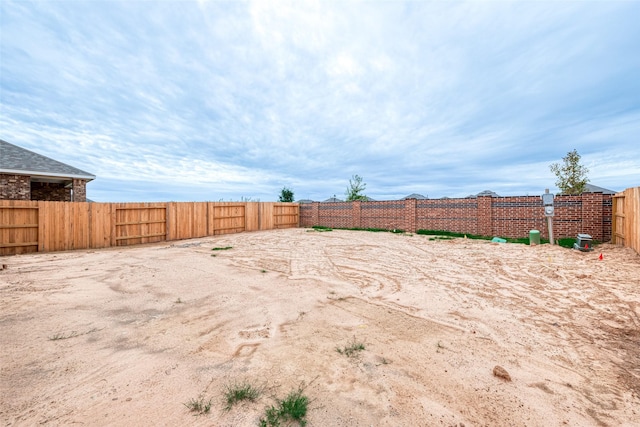 view of yard with fence
