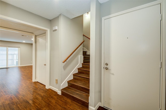 14123 Misty Meadow Ln, Houston, TX 77079 - foyer with stairway, baseboards, and wood finished floors