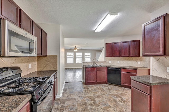 kitchen featuring a sink, dark countertops, a ceiling fan, dark brown cabinets, and black appliances