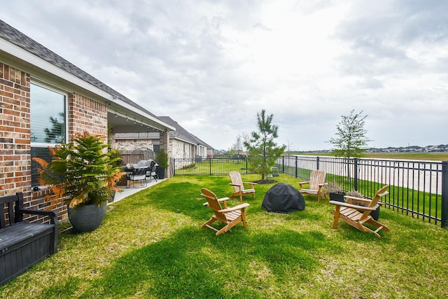 view of yard featuring a fenced backyard and a patio