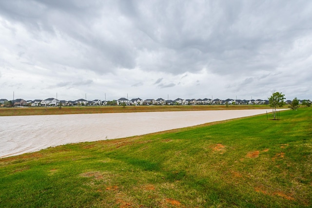 view of water feature with a residential view