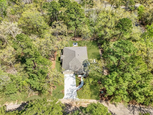20302 Peach Dr, Huntsville, TX 77320 - aerial view of property and surrounding area with a heavily wooded area
