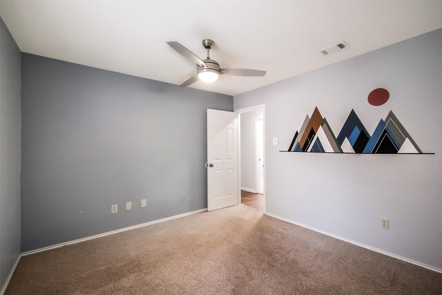 902 Rolling Mill Dr, Sugar Land, TX 77498 - carpeted empty room with visible vents, a ceiling fan, and baseboards