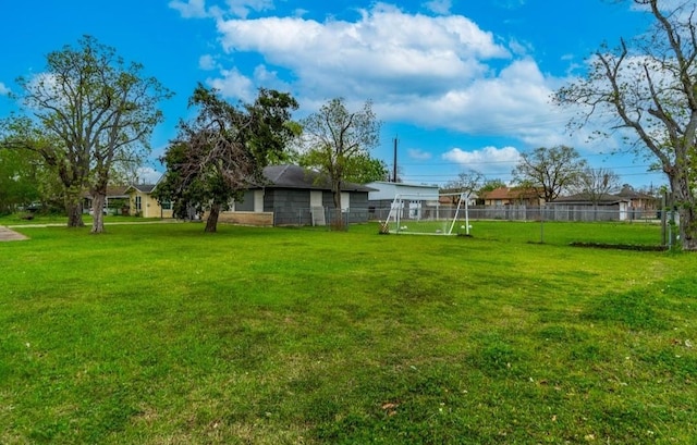 view of yard featuring fence