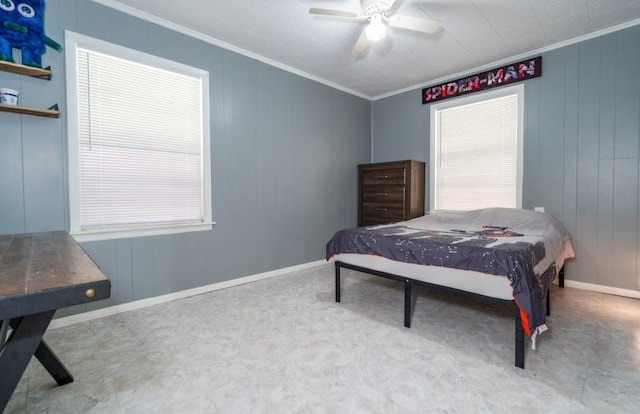 bedroom featuring baseboards, ornamental molding, and a ceiling fan