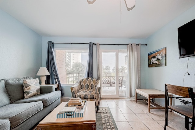 9520 Seawall Blvd Unit 126, Galveston, TX 77554 - living room featuring ceiling fan and light tile patterned flooring