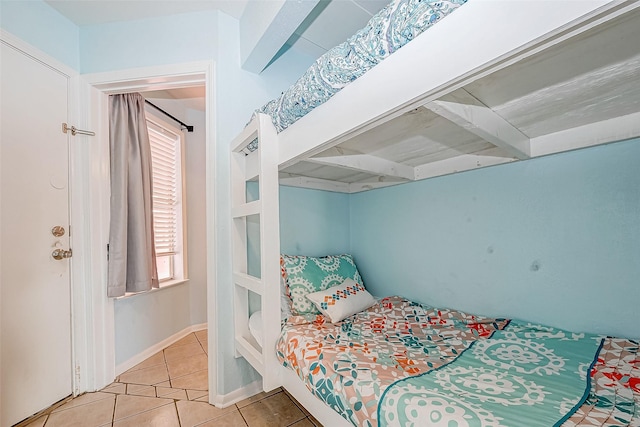 9520 Seawall Blvd Unit 126, Galveston, TX 77554 - tiled bedroom with baseboards