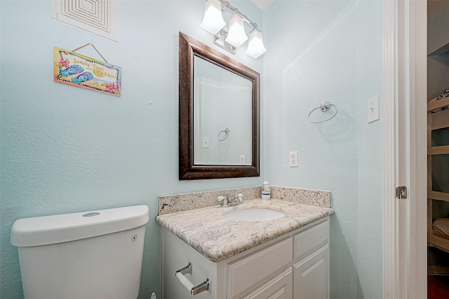 9520 Seawall Blvd Unit 126, Galveston, TX 77554 - bathroom with toilet and vanity