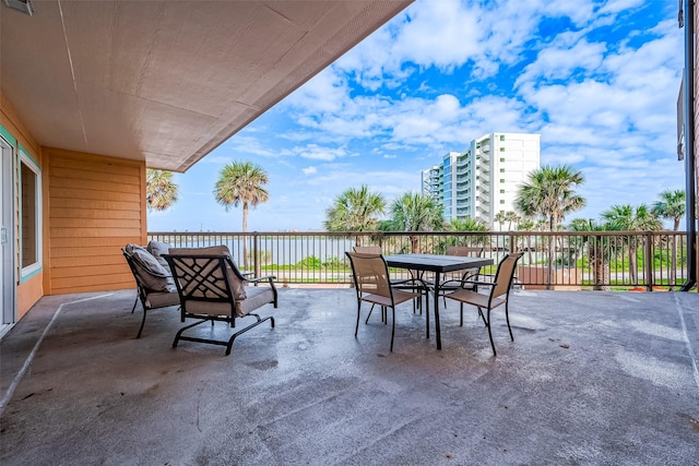 9520 Seawall Blvd Unit 126, Galveston, TX 77554 - view of patio featuring outdoor dining space