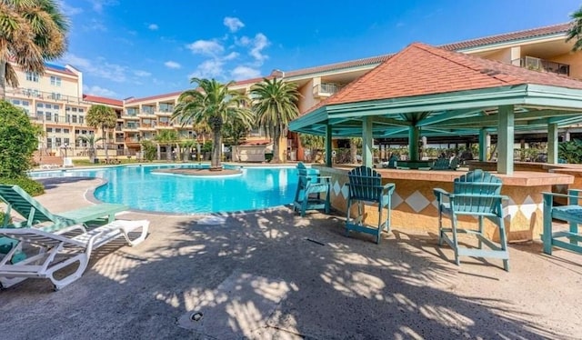 9520 Seawall Blvd Unit 126, Galveston, TX 77554 - community pool with a patio, outdoor dry bar, and a gazebo