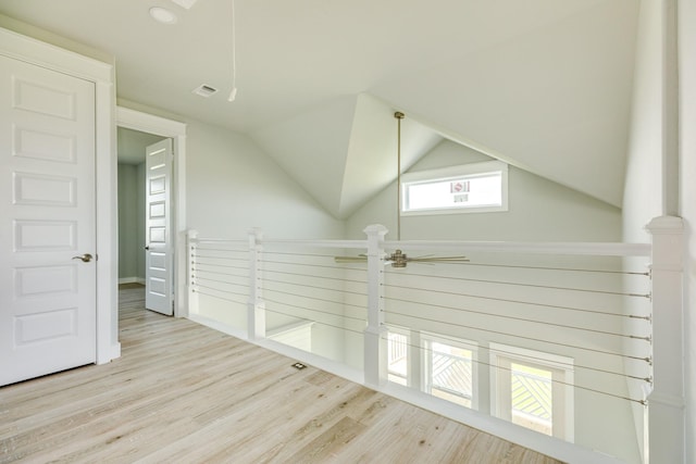 18821 Warrior Rd, Galveston, TX 77554 - additional living space featuring wood finished floors, lofted ceiling, and ceiling fan