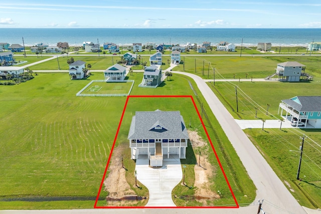 18821 Warrior Rd, Galveston, TX 77554 - aerial overview of property's location with property parcel outlined and a large body of water