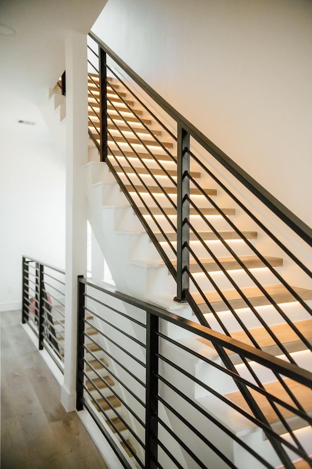 2805 Delano St, Houston, TX 77004 - stairway with wood finished floors and baseboards