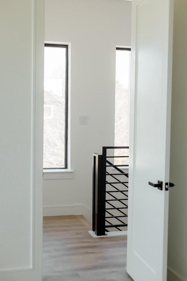 2805 Delano St, Houston, TX 77004 - stairway featuring wood finished floors and baseboards