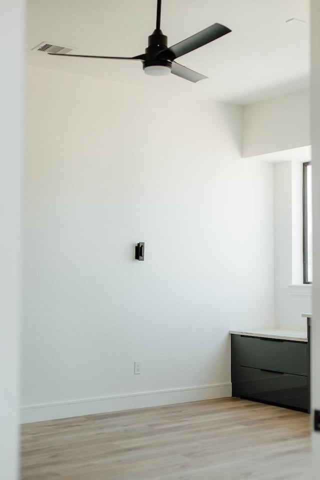 2805 Delano St, Houston, TX 77004 - spare room with ceiling fan and light wood-style floors