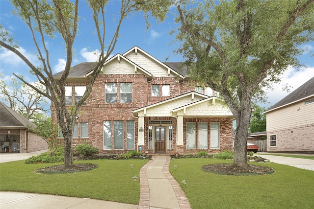 3730 Arundel Gardens Ln, Sugar Land, TX 77498 - craftsman-style home featuring brick siding and a front lawn