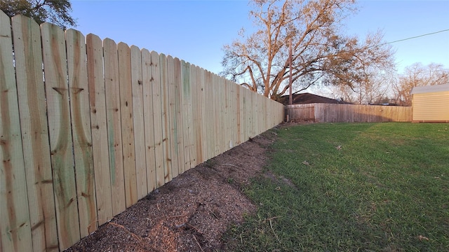 view of yard featuring a fenced backyard
