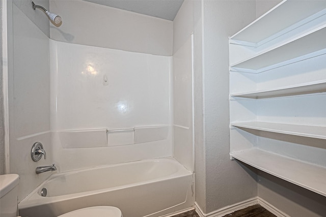5407 Matilda Bend Ln, Katy, TX 77449 - bathroom featuring toilet,  shower combination, and wood finished floors