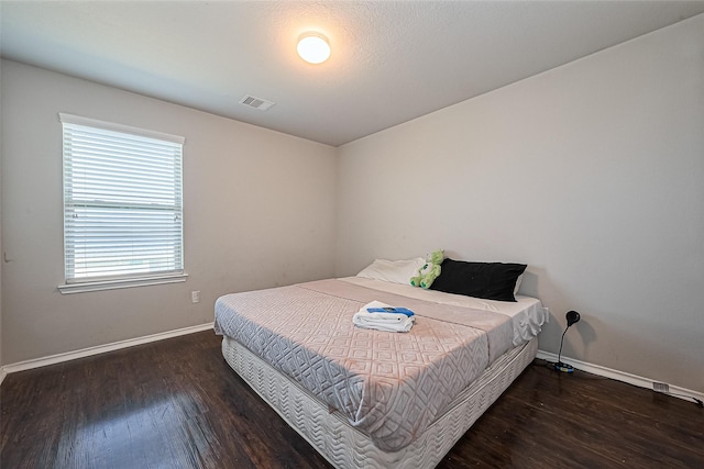 5407 Matilda Bend Ln, Katy, TX 77449 - bedroom featuring visible vents, wood finished floors, and baseboards
