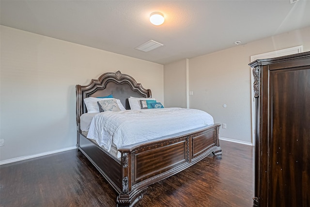 5407 Matilda Bend Ln, Katy, TX 77449 - bedroom featuring dark wood-style flooring, baseboards, and visible vents