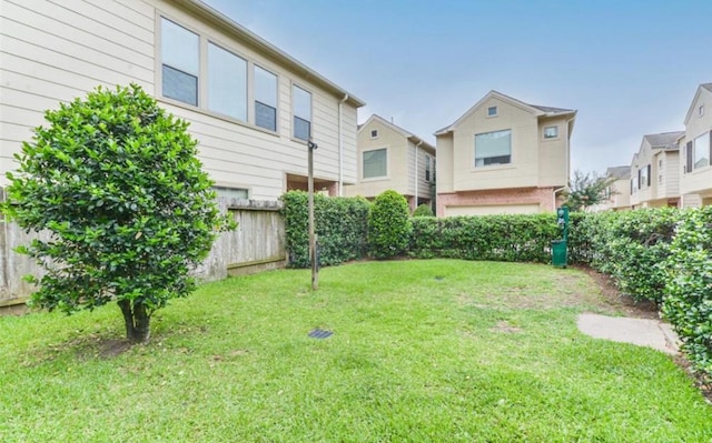 view of yard with fence