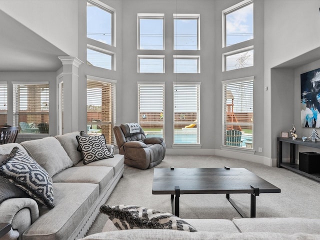 2712 Ahnya Ln, League City, TX 77573 - living area with carpet floors and baseboards