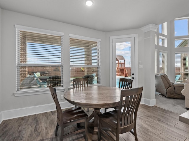 2712 Ahnya Ln, League City, TX 77573 - dining room with baseboards and wood finished floors
