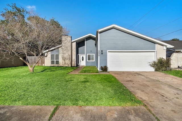 mid-century inspired home featuring fence, a chimney, a garage, a front yard, and driveway