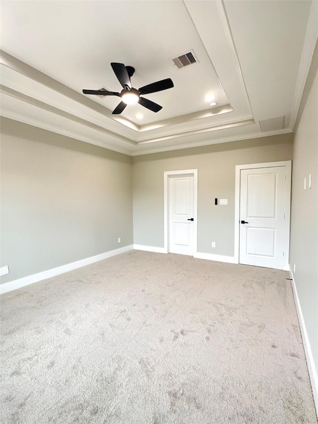 635 Lily St, Prairie View, TX 77484 - carpeted empty room with a raised ceiling, a ceiling fan, crown molding, and baseboards