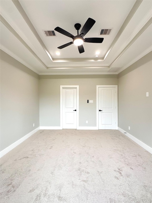 635 Lily St, Prairie View, TX 77484 - carpeted spare room with a raised ceiling, a ceiling fan, crown molding, and baseboards