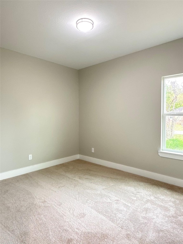 635 Lily St, Prairie View, TX 77484 - empty room featuring carpet flooring and baseboards
