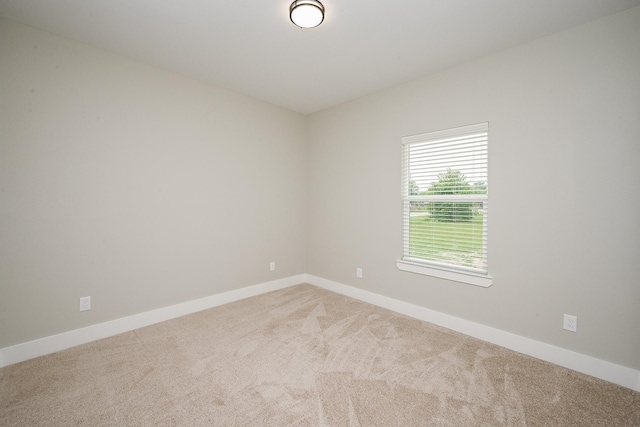 635 Lily St, Prairie View, TX 77484 - carpeted empty room with baseboards