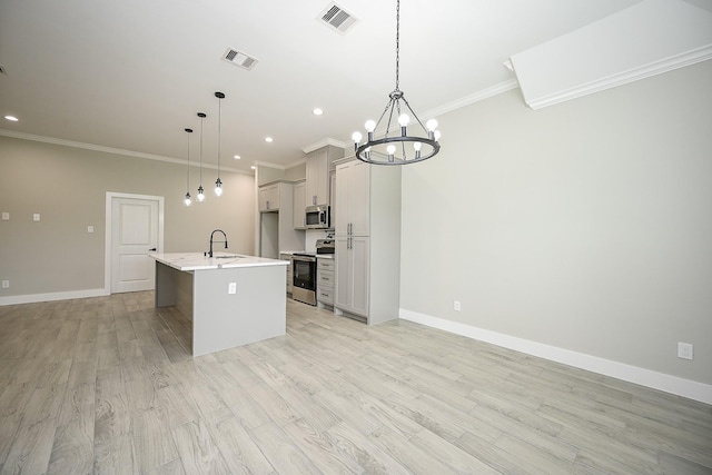 635 Lily St, Prairie View, TX 77484 - kitchen featuring appliances with stainless steel finishes, crown molding, light countertops, a chandelier, and recessed lighting