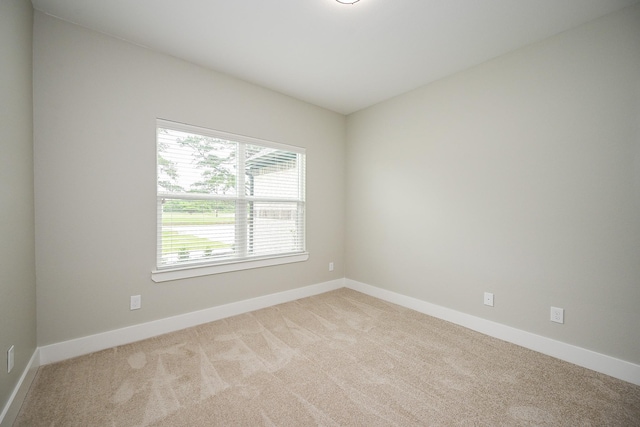 635 Lily St, Prairie View, TX 77484 - carpeted spare room with baseboards