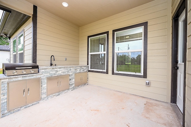 635 Lily St, Prairie View, TX 77484 - view of patio / terrace with exterior kitchen and a sink