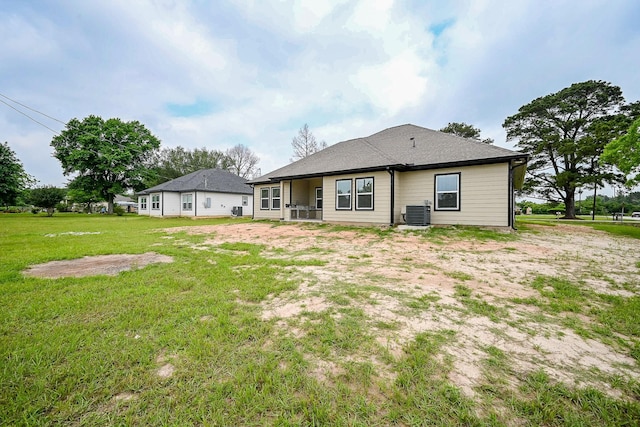 635 Lily St, Prairie View, TX 77484 - back of property with a lawn